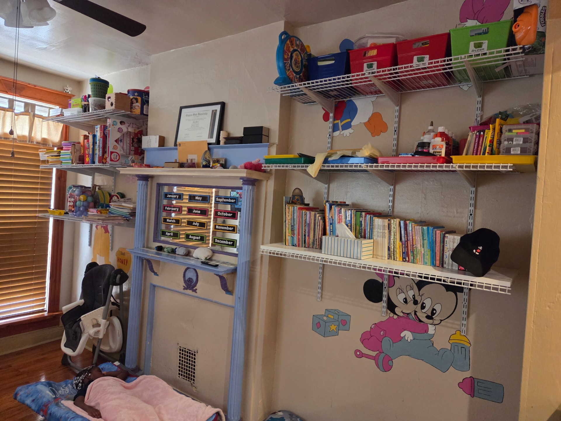 Books, bins, and a cozy nap spot for our littlest learners.
